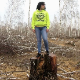 A Russian girl wearing sunglasses takes a huge shit while bending over the side of large tree stump in a wooded, outdoor location. She wipes her ass, and her impressive product is later shown on the ground. About 4 minutes.